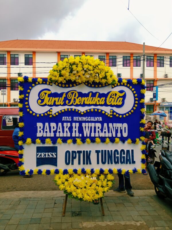 bunga papan duka cita